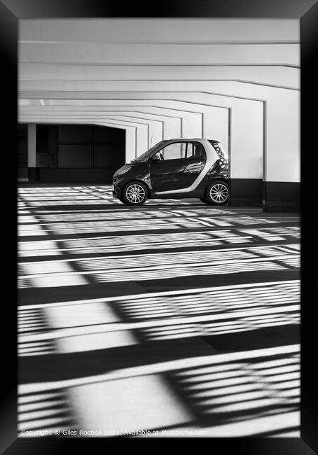 Graphic shadows and car Framed Print by Giles Rocholl