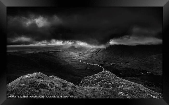 Dark storm clouds Ireland Framed Print by Giles Rocholl