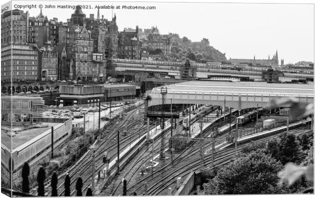 Edinburgh Castle and Railway Tracks Canvas Print by John Hastings