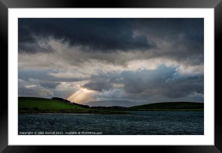 Sun rays Irish lakes and hills Framed Mounted Print by Giles Rocholl