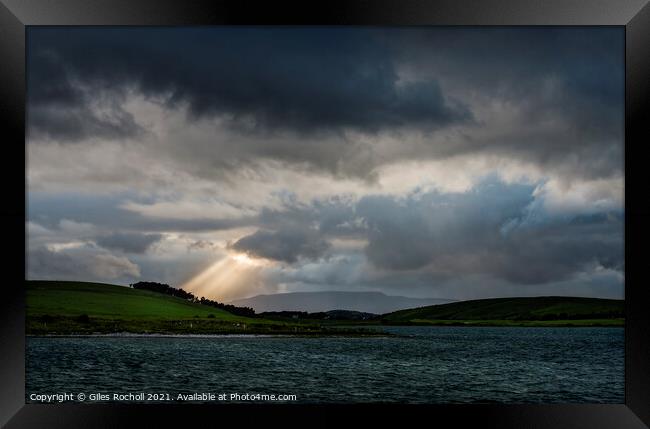 Sun rays Irish lakes and hills Framed Print by Giles Rocholl