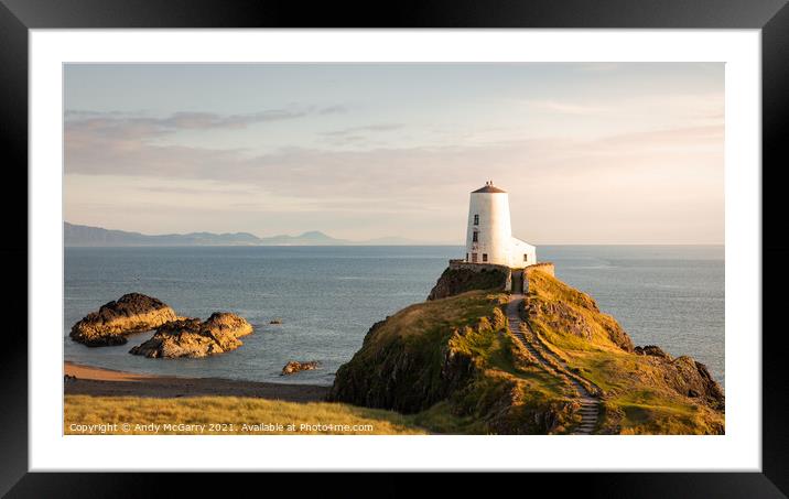 Radiant Sunset over Llanddwyn Lighthouse Framed Mounted Print by Andy McGarry