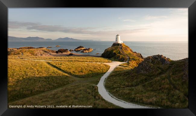 Majestic Sunset at Llanddwyn Lighthouse Framed Print by Andy McGarry