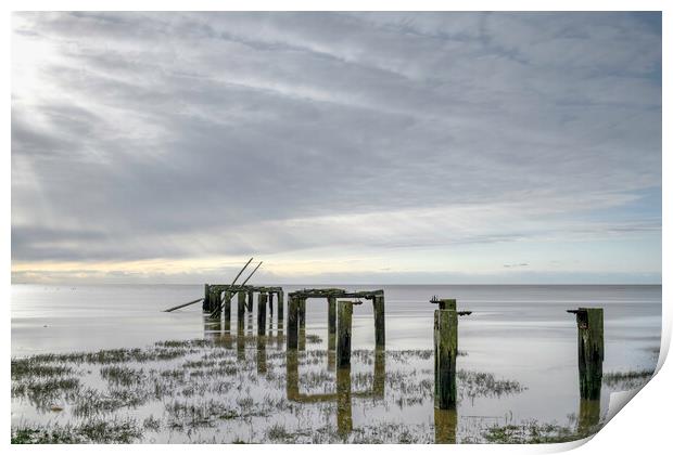 The old pier at Snetisham Beach Print by Robbie Spencer