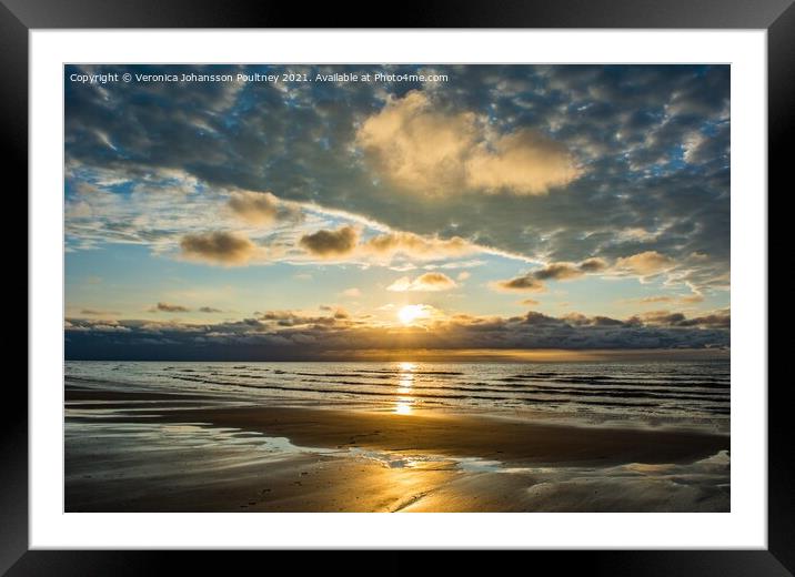 A sunset over a beach in Norfolk Framed Mounted Print by Veronica in the Fens