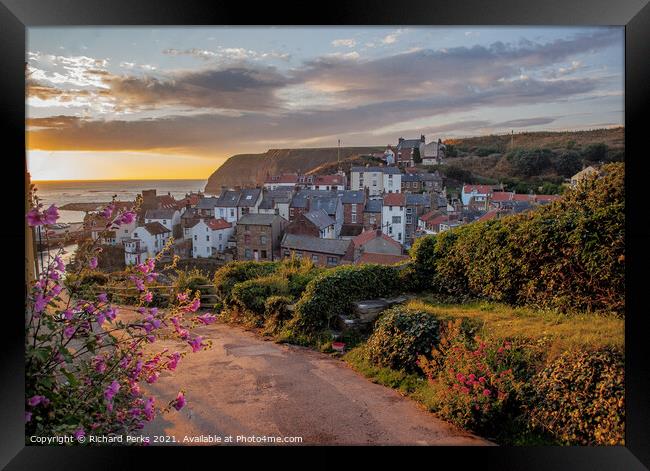 Early morning glow in Staithes Framed Print by Richard Perks