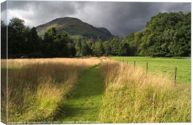 A dark moody sky at Patterdale Canvas Print by Simon Armstrong