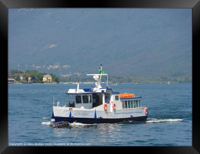 A  Ferry on Lake Maggiore Framed Print by John Bridge