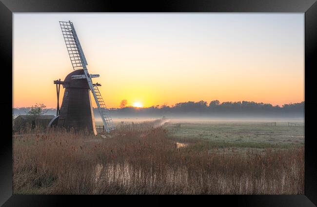 An old working windmill on Norfolk Broads Framed Print by Robbie Spencer