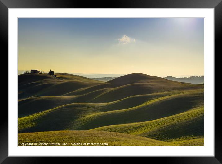 Rolling hills and farm in Crete Senesi. Tuscany Framed Mounted Print by Stefano Orazzini