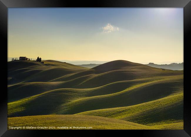 Rolling hills and farm in Crete Senesi. Tuscany Framed Print by Stefano Orazzini