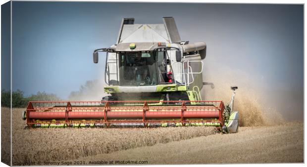 Mighty Machine Harvesting Barley Canvas Print by Jeremy Sage
