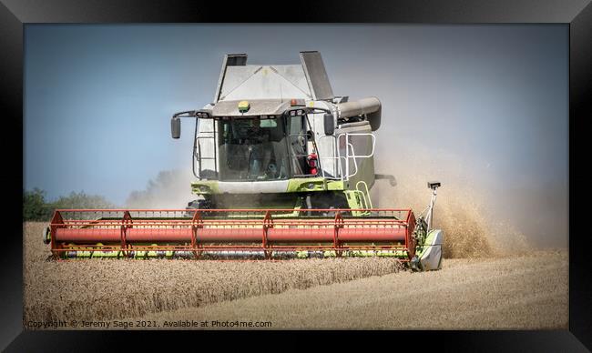 Mighty Machine Harvesting Barley Framed Print by Jeremy Sage