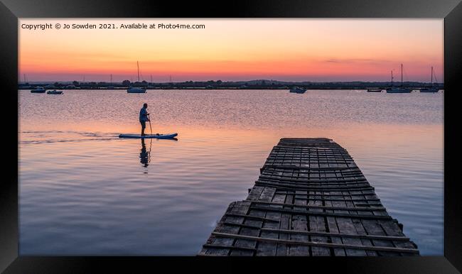 Paddling back to shore Framed Print by Jo Sowden