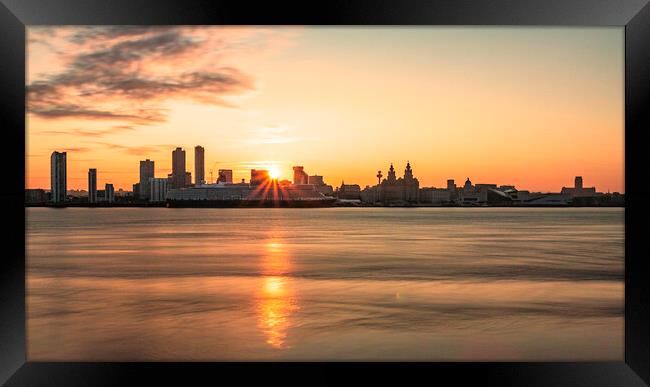 A sunrise over the river mersey with the Liverpool skyline. Framed Print by Kevin Elias