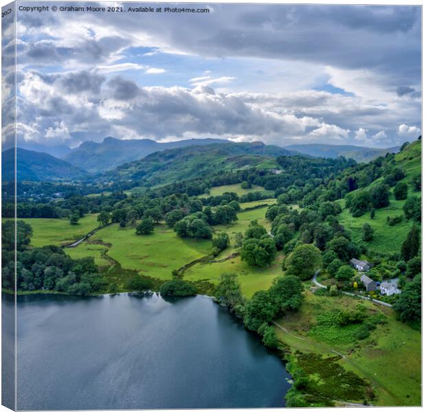 Loughrigg Tarn looking west towards the Langdale Pikes Canvas Print by Graham Moore