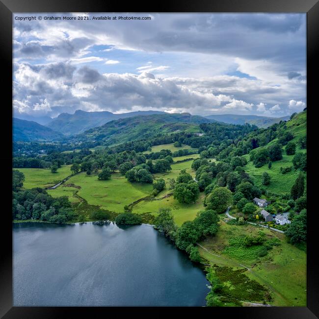 Loughrigg Tarn looking west towards the Langdale Pikes Framed Print by Graham Moore