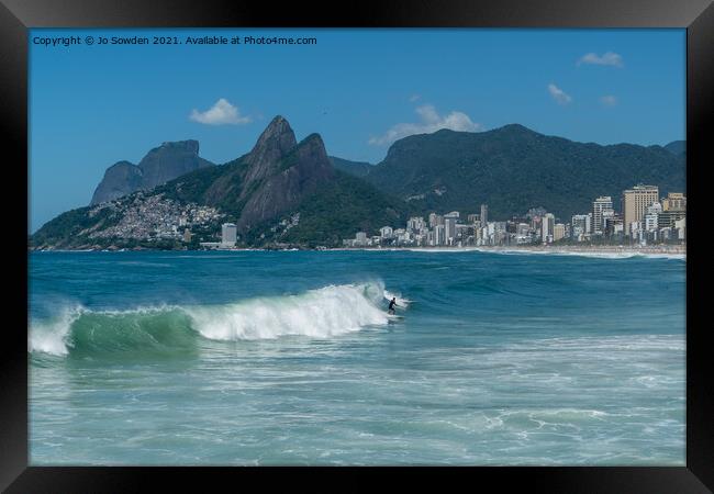 Surfing in Rio Framed Print by Jo Sowden