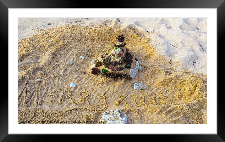 Merry Xmas greetings with Santa Claus on sand beach 1c Framed Mounted Print by Hanif Setiawan