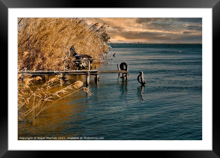 Twilight Fishing on the Golden Ebro Delta Framed Mounted Print by Roger Mechan