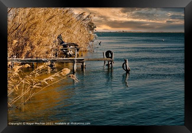 Twilight Fishing on the Golden Ebro Delta Framed Print by Roger Mechan