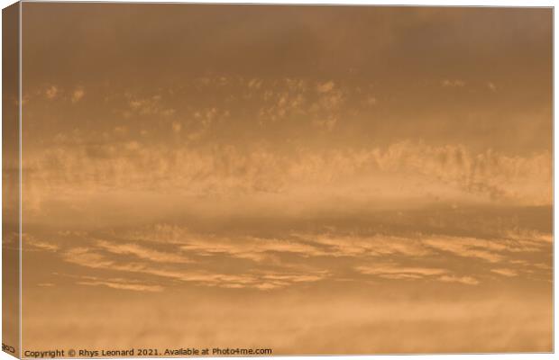 Golden sunset sky, telephoto perspective gives abstract background Canvas Print by Rhys Leonard
