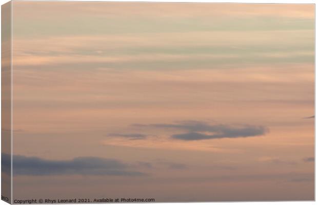 Plain pastel color themed background, made of gentle clouds at sunset Canvas Print by Rhys Leonard