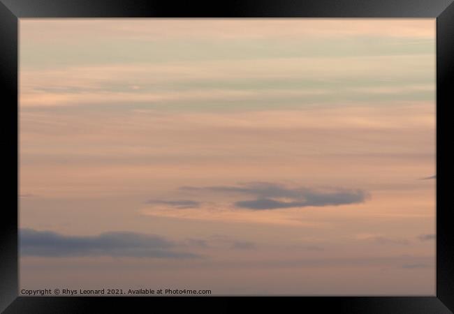 Plain pastel color themed background, made of gentle clouds at sunset Framed Print by Rhys Leonard