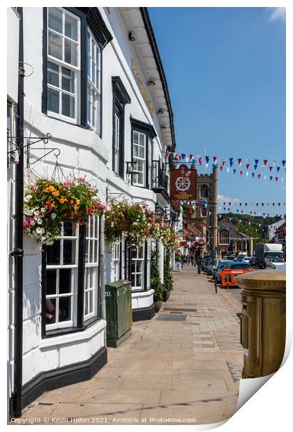 Hanging baskets outside the Catherine Wheel pub  Print by Kevin Hellon