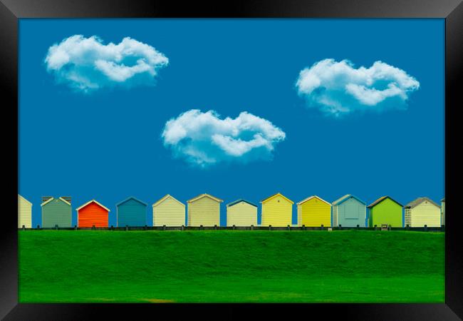 Beach Huts And Clouds Framed Print by Chris Lord