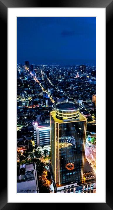 The Phnom Penh skyline at night Framed Mounted Print by Arnaud Jacobs