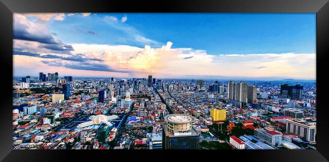 Aerial view of Phnom Penh at dusk Framed Print by Arnaud Jacobs