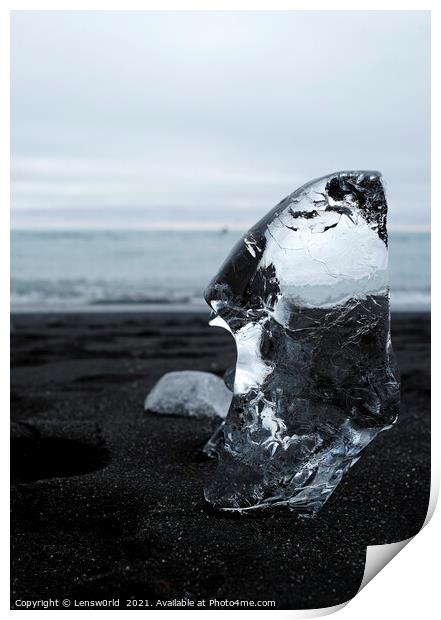 Clear piece of glacial ice on black sand Print by Lensw0rld 