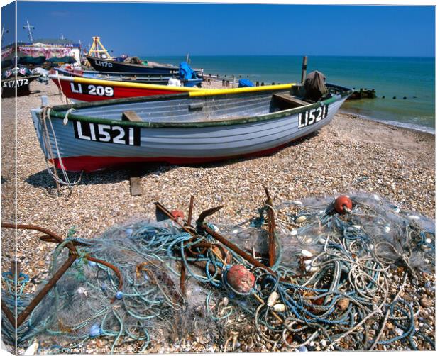 Boats and fishing tackle on beach, Bognor Regis, West Sussex, UK Canvas Print by Geraint Tellem ARPS