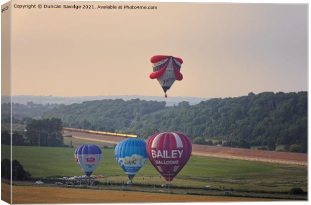 Hot air Balloon launch from the Maize field near Bath Canvas Print by Duncan Savidge