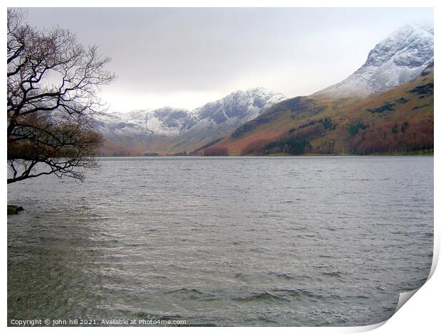 Snow Capped mountains at Buttermere Lake Print by john hill