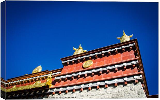 Tibetan Monastery and roof top decoration of Buddhism elements Canvas Print by Adelaide Lin