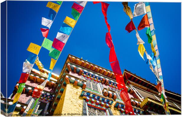 Colorful Tibetan prayer flags spreading good fortune hanging on  Canvas Print by Adelaide Lin