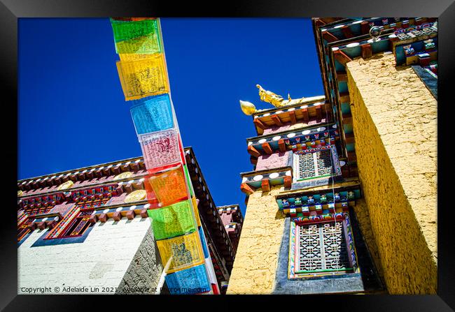 Colorful Tibetan monastery with prayer flags  Framed Print by Adelaide Lin