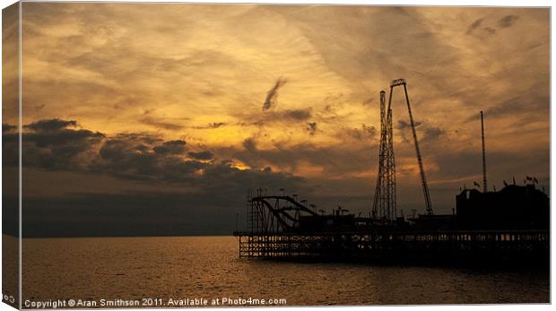 Sunset over the Pier Canvas Print by Aran Smithson