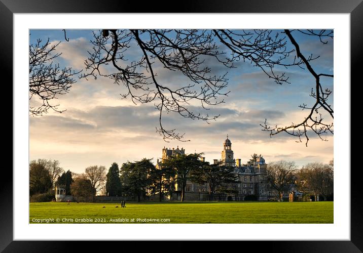 Thoresby Hall in late evening sunlight Framed Mounted Print by Chris Drabble