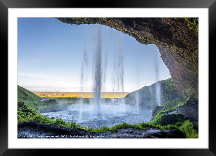 Iceland. Walking behind Seljalandsfoss waterfall Framed Mounted Print by Delphimages Art