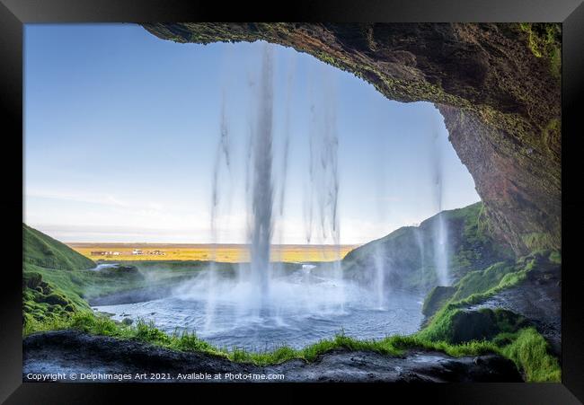 Iceland. Walking behind Seljalandsfoss waterfall Framed Print by Delphimages Art