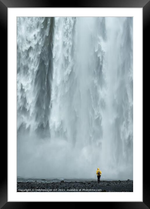 Iceland. Woman looking at Skogafoss waterfall Framed Mounted Print by Delphimages Art