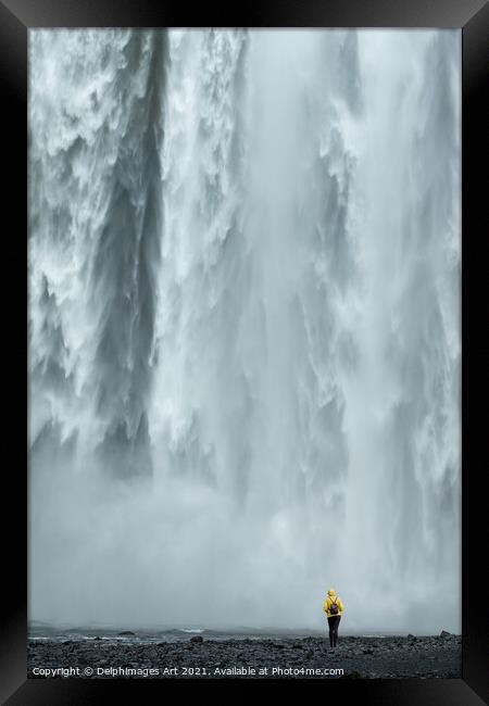 Iceland. Woman looking at Skogafoss waterfall Framed Print by Delphimages Art