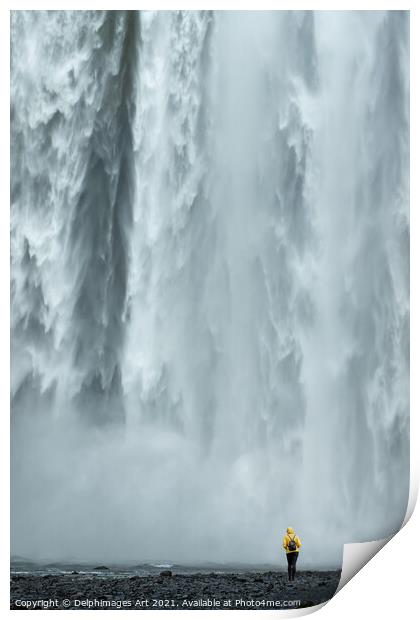 Iceland. Woman looking at Skogafoss waterfall Print by Delphimages Art