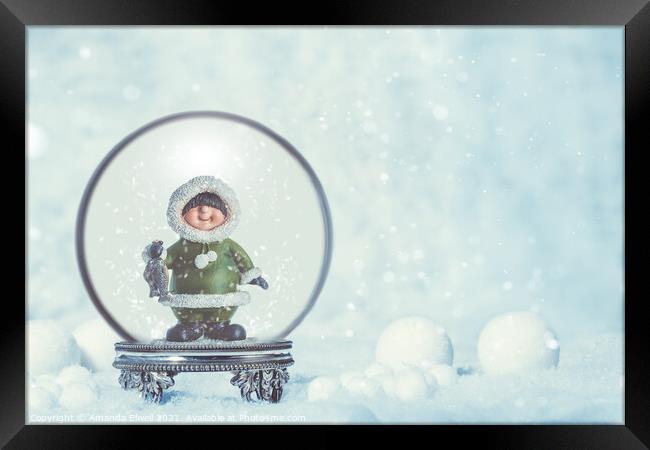 Snowglobe With Eskimo Framed Print by Amanda Elwell