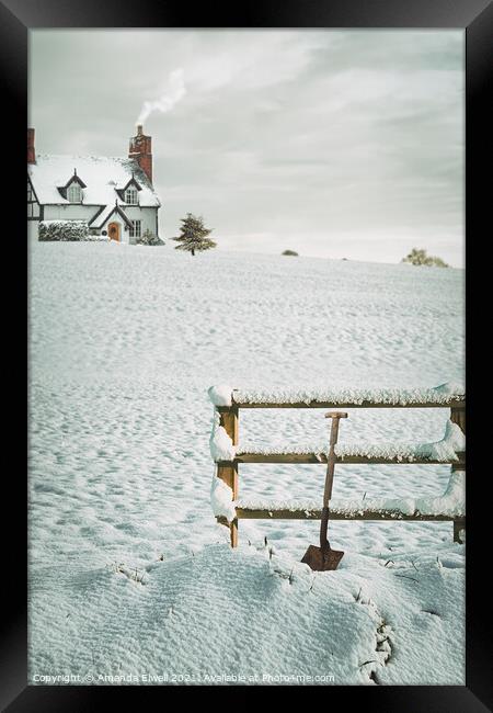 Snow Covered Fence With Shovel Framed Print by Amanda Elwell