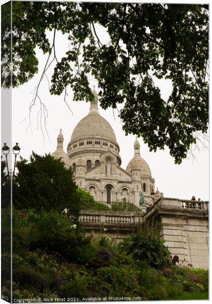 Sacre-Coeur Basilica behind the Trees Canvas Print by Nick Hirst