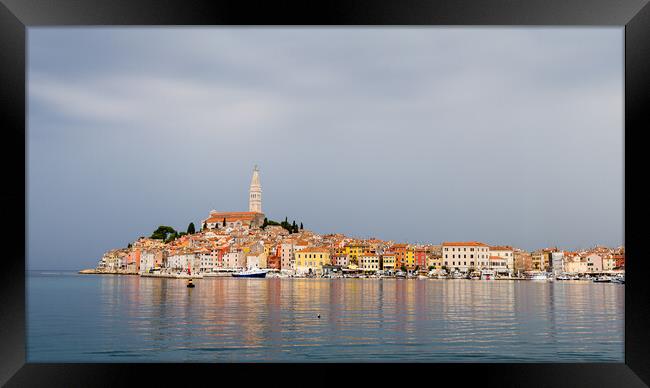 Rovinj reflecting in the Adriatic Sea Framed Print by Jason Wells